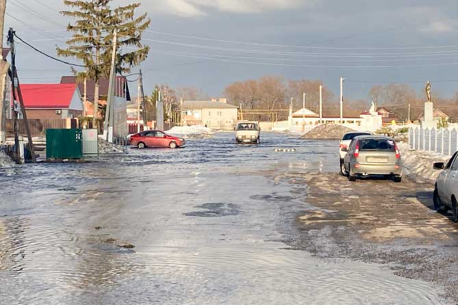 затопленная улица в Нижнем Санчелеево