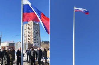 Российский флаг на перекрестке улиц Громовой и Матросова
