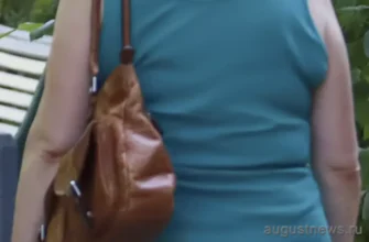 женщина несет сумку через плечо