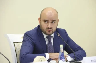 врио губернатора за столом