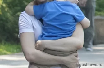 женщина с ребенком на руках