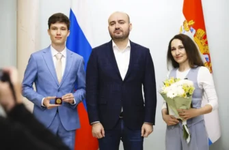 губернатор и выпускник школы с медалью
