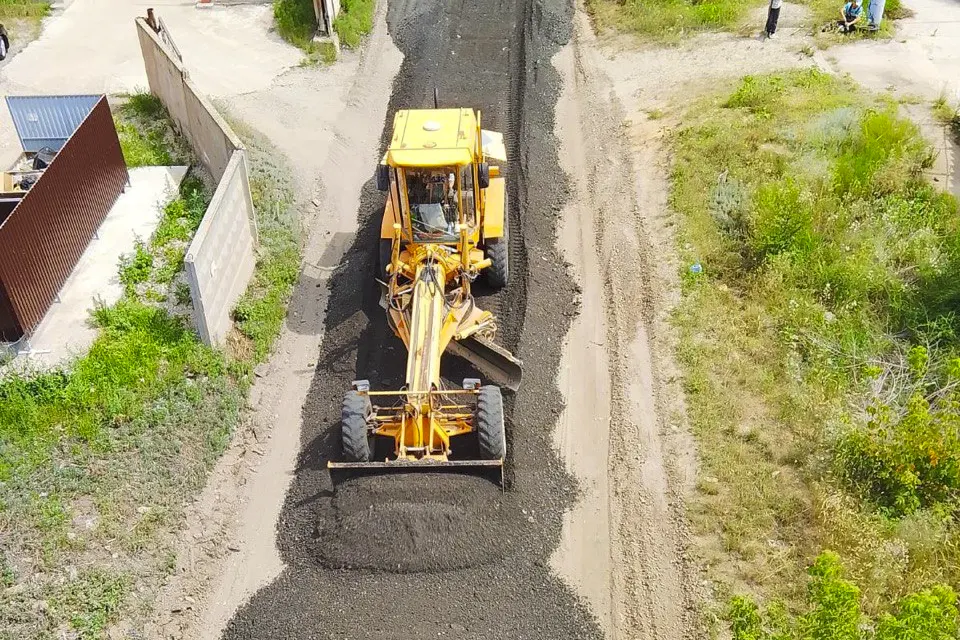 отсыпка дороги асфальтогранулятом на улице Нижегородской