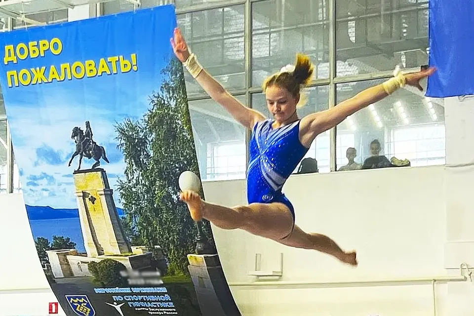 выступление гимнастки на бревне