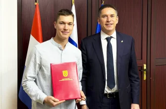 олимпийский чемпион в парном разряде